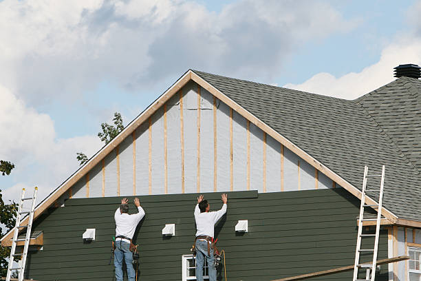 Professional Siding technician working in Line Lexington, PA
